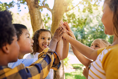Buy stock photo Happy, playing and children with a high five for a game, support and team building at a park. Smile, together and friends with hands for motivation, connection and celebration at a summer camp