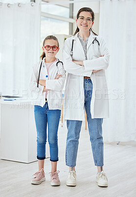 Buy stock photo Portrait, doctor and child at work with arms crossed, dress up and learning about job of mother. Game, future and dream career with playing medical intern with confidence and role model at clinic