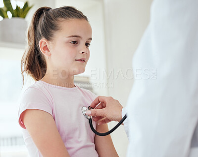 Buy stock photo Shot of a little girl getting a checkup at a hospital