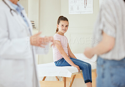 Buy stock photo Shot of a little girl at a checkup at a hospital