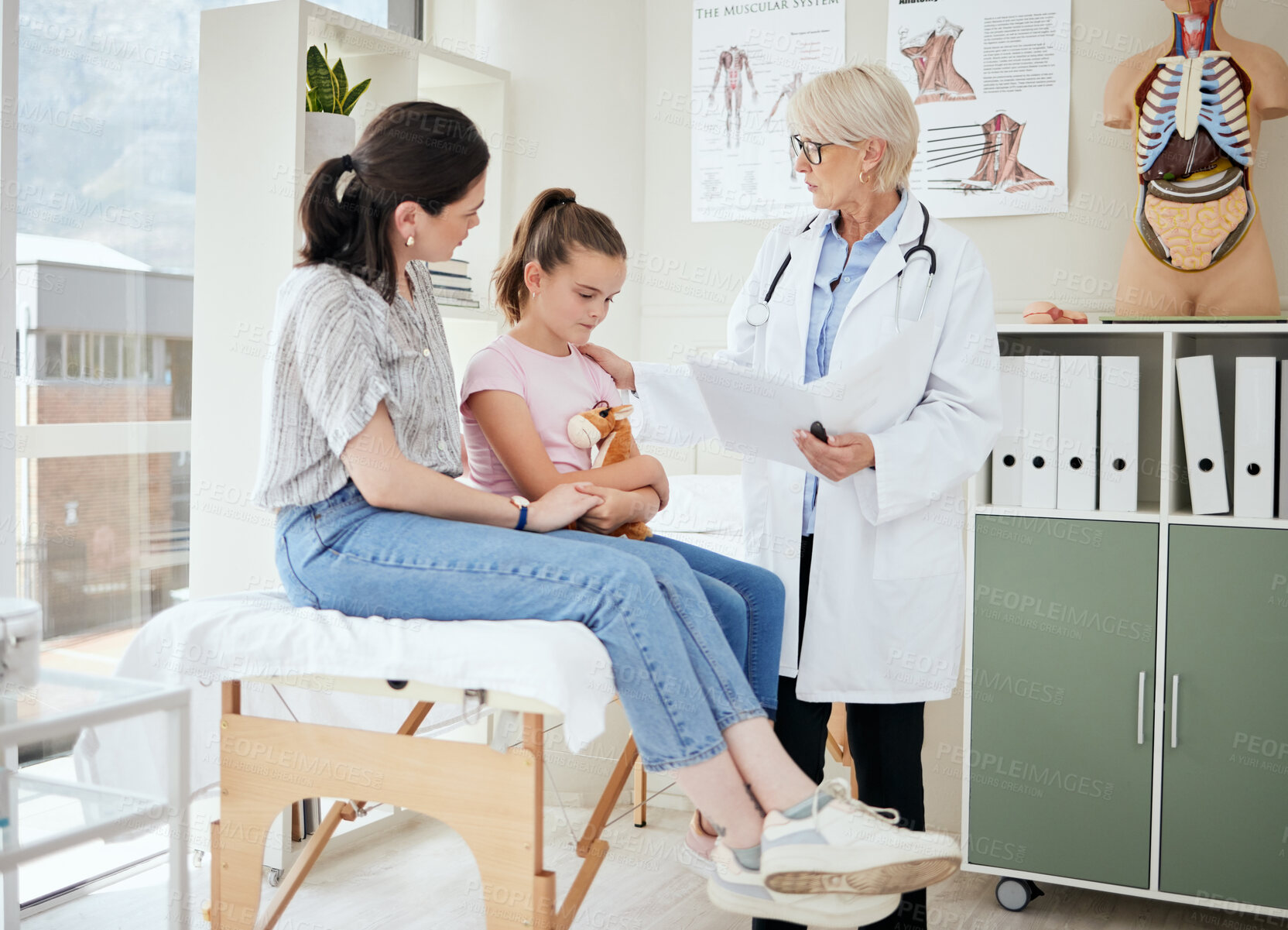 Buy stock photo Doctor, family and support in office for healthcare, medical advice and professional opinion for child wellness. Pediatrician, mother and daughter in consultation for recovery, diagnosis or medicare