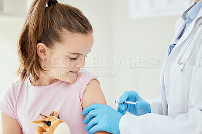 Buy stock photo Shot of an unrecognizable doctor giving a little girl an injection at a hospital