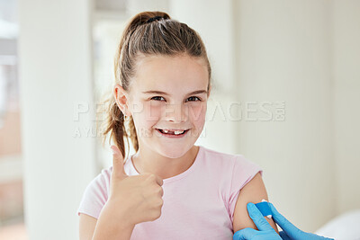 Buy stock photo Child, thumbs up and hospital bandage in portrait, doctor hands and approval for treatment at clinic. Female person, girl and bandaid for immunization booster, pediatrician and emoji for flu shot