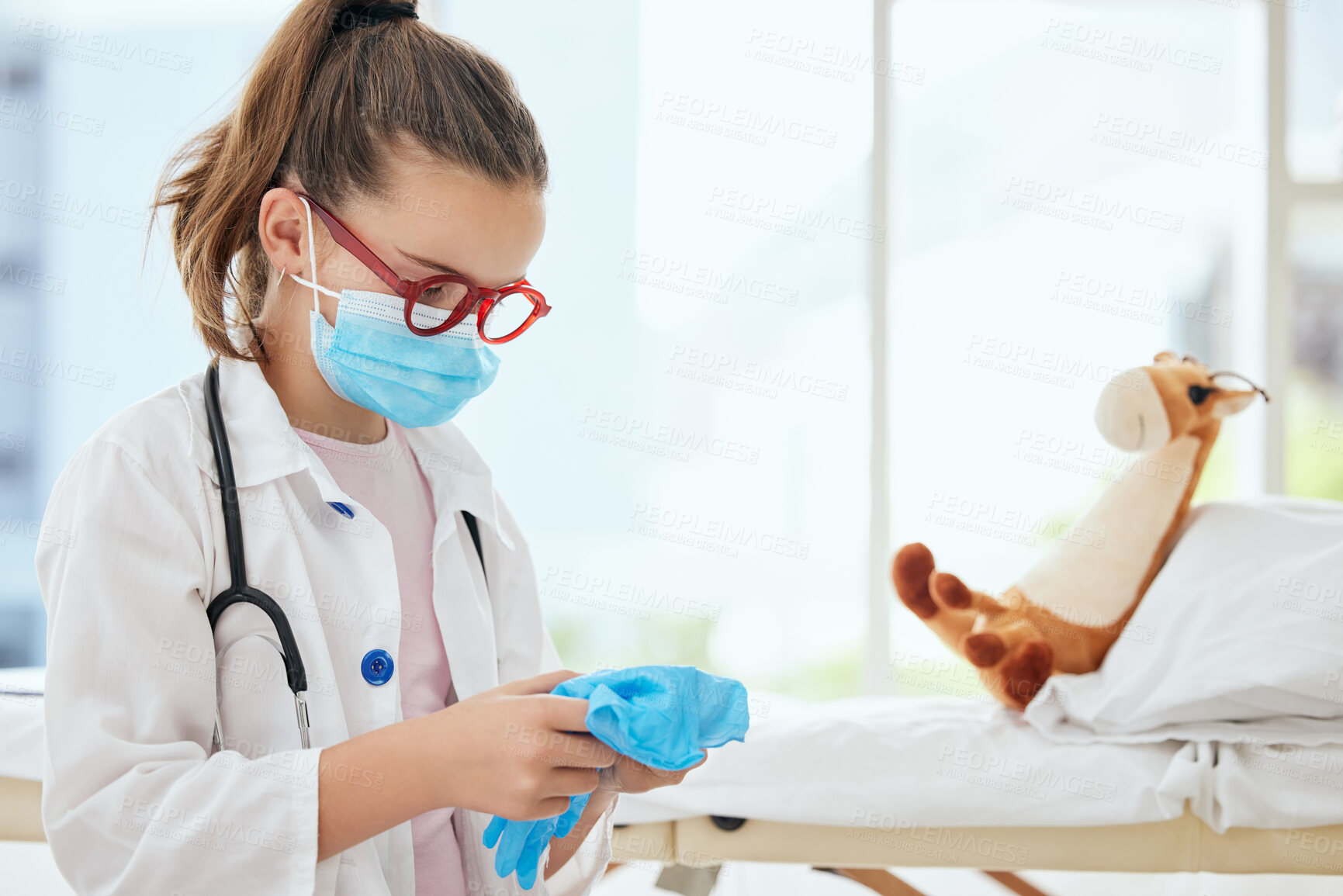 Buy stock photo Pretend, gloves and child doctor with teddy bear in home for fantasy, playing or imagination. Future, healthcare and girl medical worker with giraffe plush toy for cardiology checkup at house.