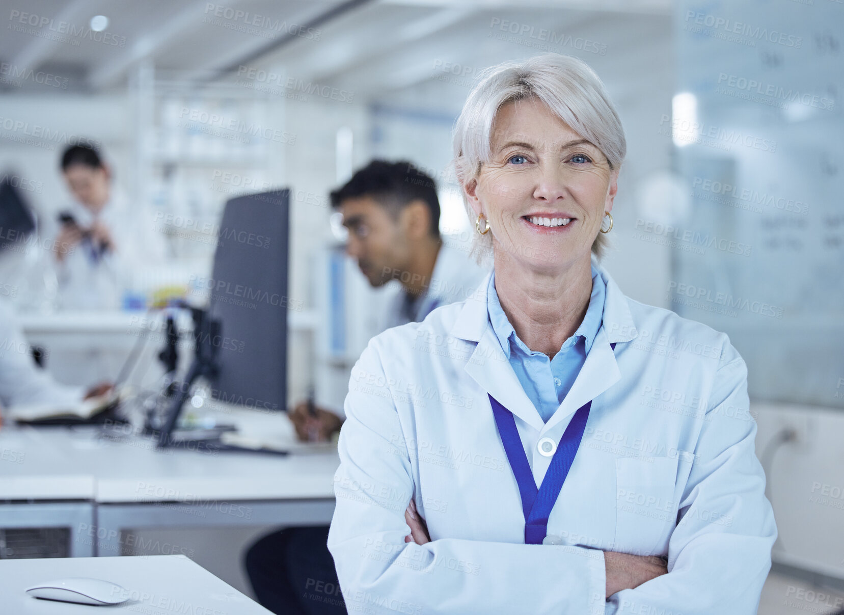 Buy stock photo Portrait, mature woman and smile in lab, scientist and confident for science, arms crossed and healthcare. Proud, medical research and process for medicine, person and cure for mpox in Denmark