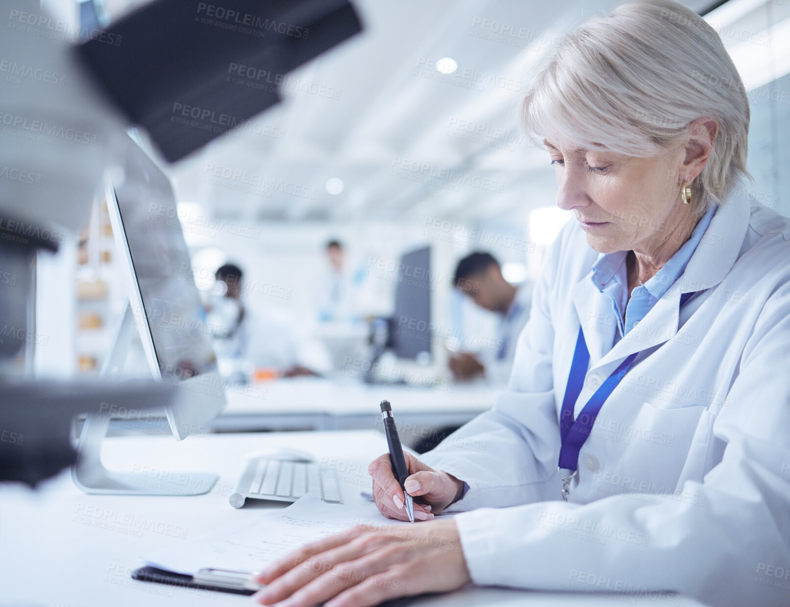 Buy stock photo Mature scientist, writing and medical research in chemistry lab for science experiment in pharmaceutical. Female person, clipboard and results in pathology test, analysis and mpox vaccine in Denmark