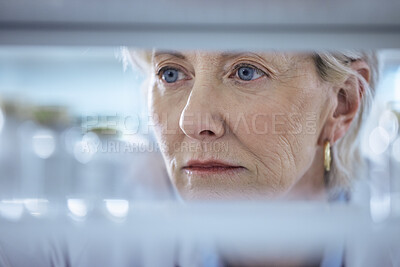 Buy stock photo Mature scientist, medical research and thinking in chemistry lab for science experiment in pharmaceutical. Female person, specialist and results in pathology test, analysis and mpox vaccine in clinic