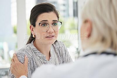 Buy stock photo Patient, consultation and comfort at a clinic with stress and encouragement about cancer results. Healthcare, help and consulting with doctor at hospital for anxiety or worry with empathy with trust.