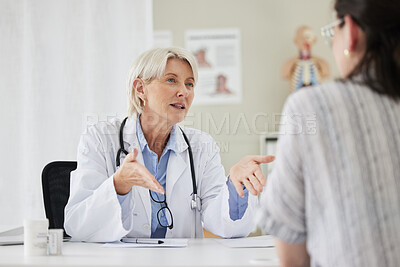 Buy stock photo Senior, doctor and patient for consultation at the clinic about health condition and wellness. Medical, professional and women with communication at hospital in the office about medicine and surgery.