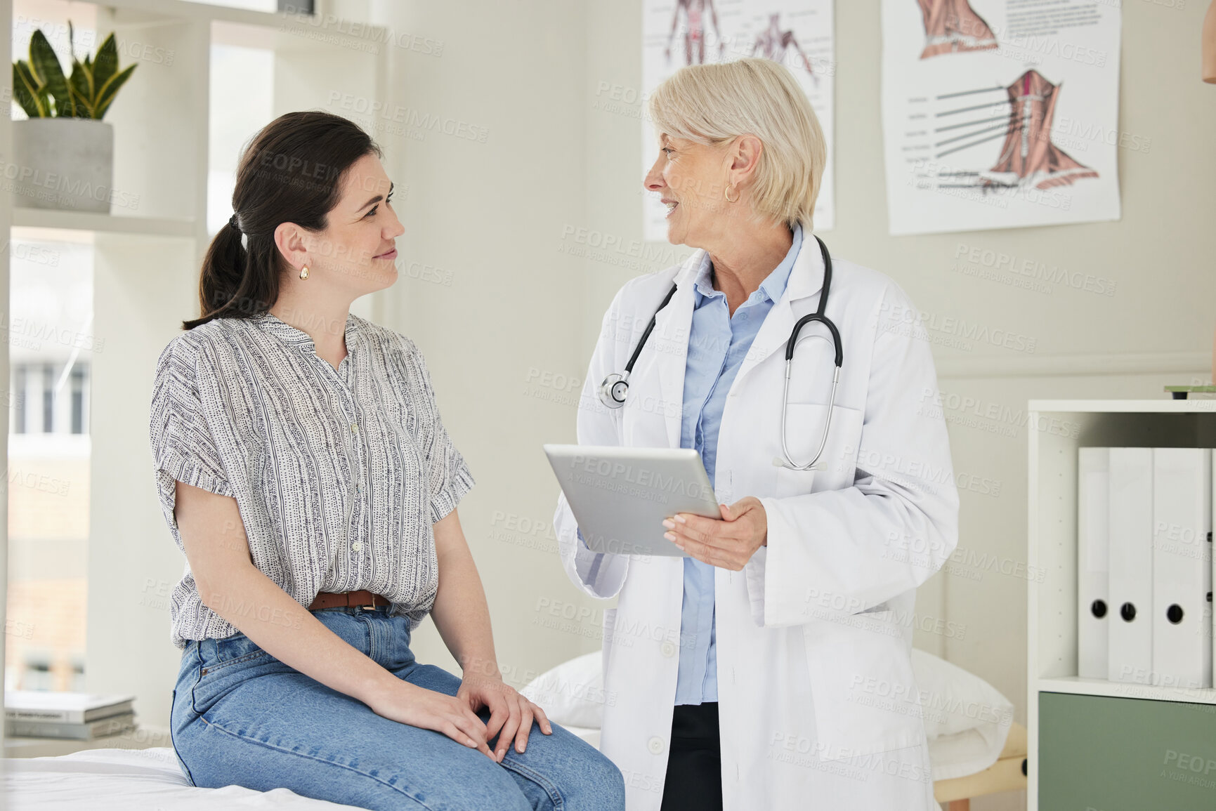 Buy stock photo Women, doctor and patient with tablet at office for feedback on consultation, advice and diagnosis. Hospital, medical professional and discussion with smile or happy for good news, support and health