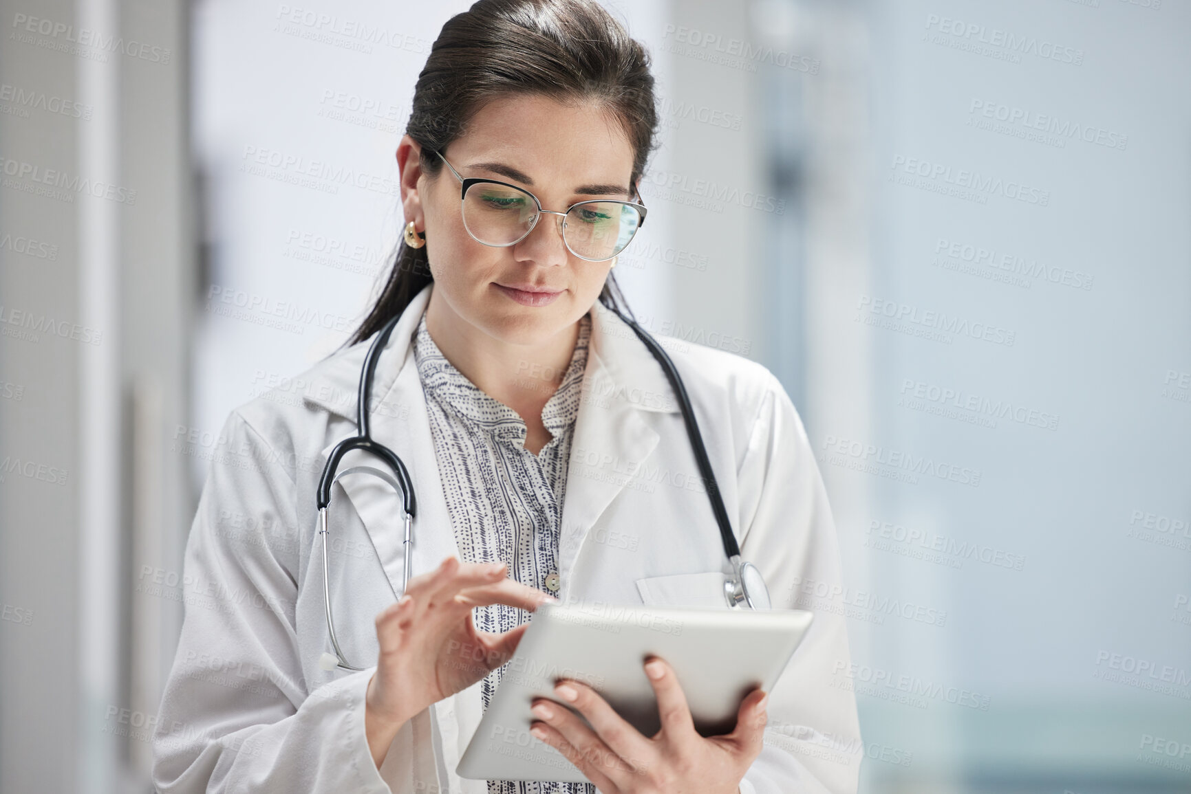 Buy stock photo Idea, doctor and woman research on tablet, online wellness or telehealth in hospital. Happy medical worker thinking, technology and scroll on digital website, healthcare app or reading email