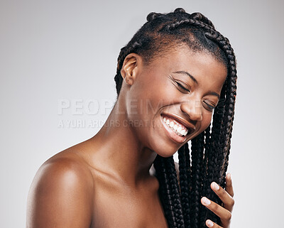 Buy stock photo Cropped shot of an attractive young woman posing in studio against a brown background