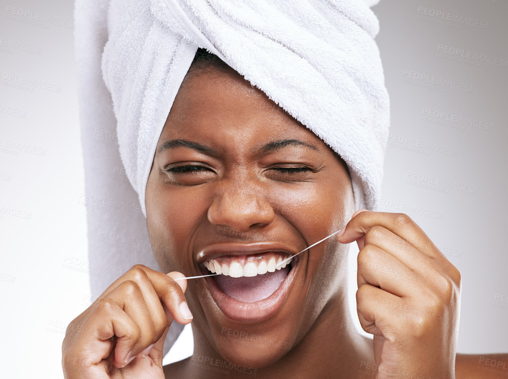 Buy stock photo Happy, black woman and portrait with dental floss for teeth cleaning, hygiene or gum care on a studio background. Young African, female person or model with smile for tooth, mouth or oral cavity