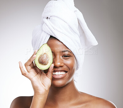 Buy stock photo Beauty, skincare and avocado with portrait of black woman in studio for cosmetics, omega 3 and facial. Self care, glow and organic treatment with person on white background for clean, natural or spa
