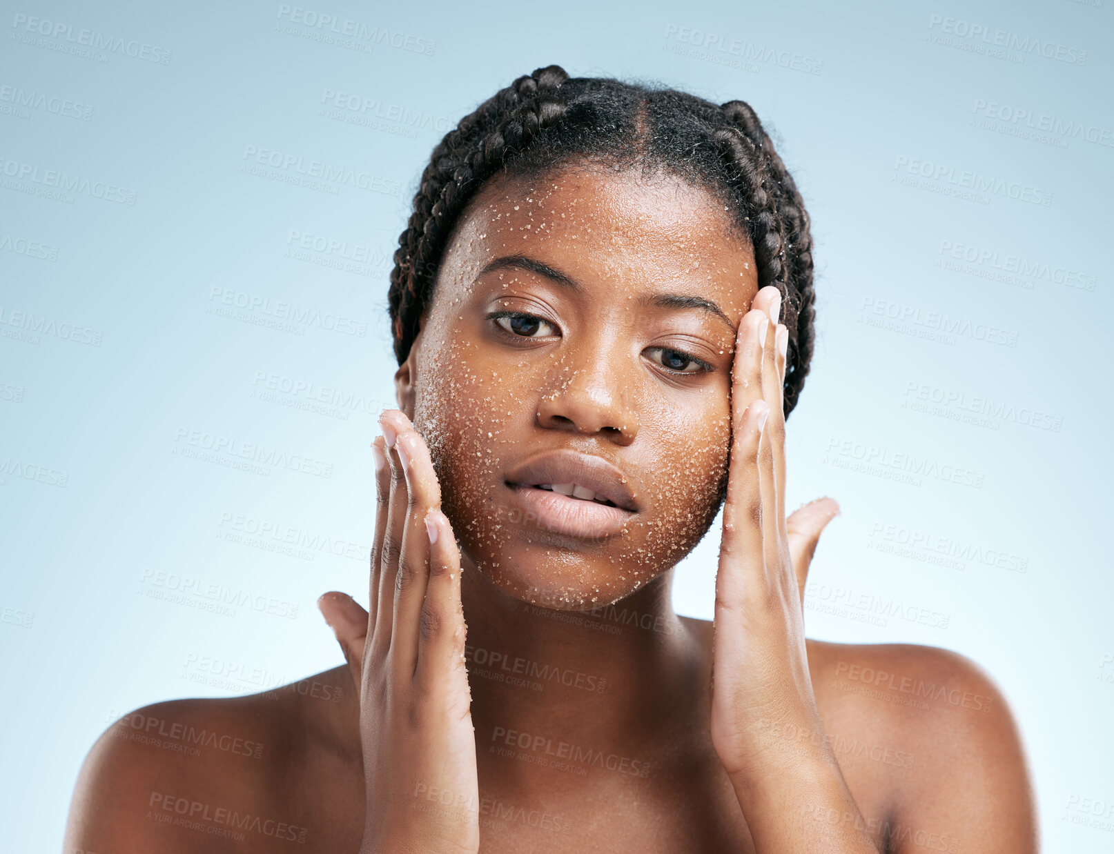 Buy stock photo Beauty, skincare and scrub with portrait of black woman in studio for cosmetics, exfoliate and facial. Self care, glow and shine with female model on blue background for clean, dermatology and spa