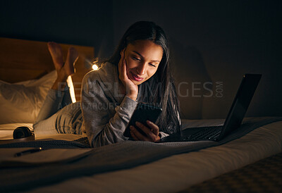 Buy stock photo Student, laptop and notebook at night for study, learning and university in home on bed with online course. Woman, technology and writing in apartment for college exam, education and research project