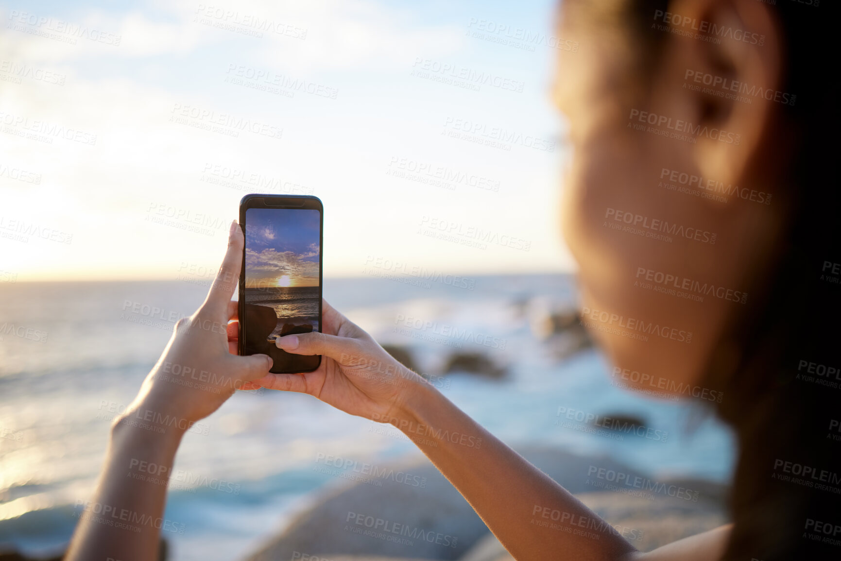 Buy stock photo Hands, photography and beach sunset with phone screen for landscape as memory or social media post.  Female person, outdoor and view in nature for zen on holiday, vacation or travel adventure in Peru