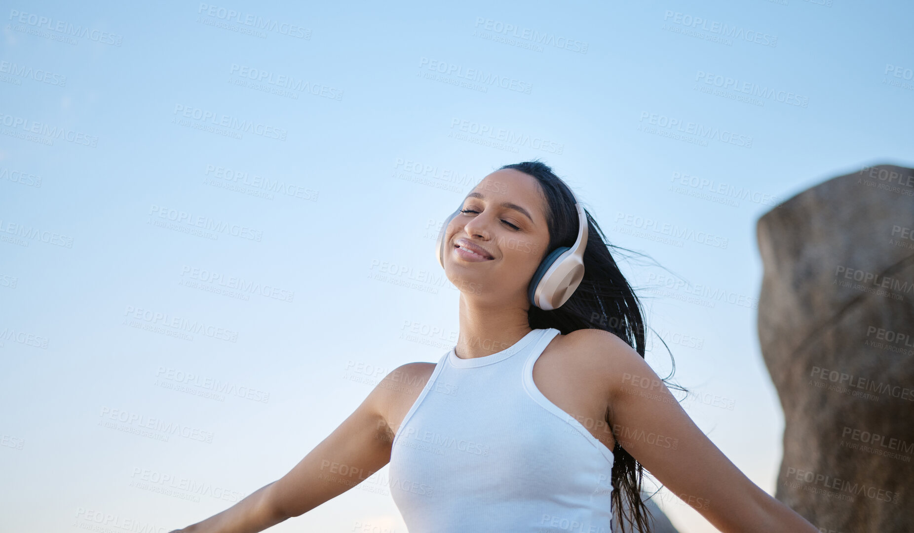 Buy stock photo Outdoor, woman and happy with eyes closed on headphones for music, audio and radio in Brazil. Female person, outside and smile or satisfied with streaming for motivational sound to relax on break