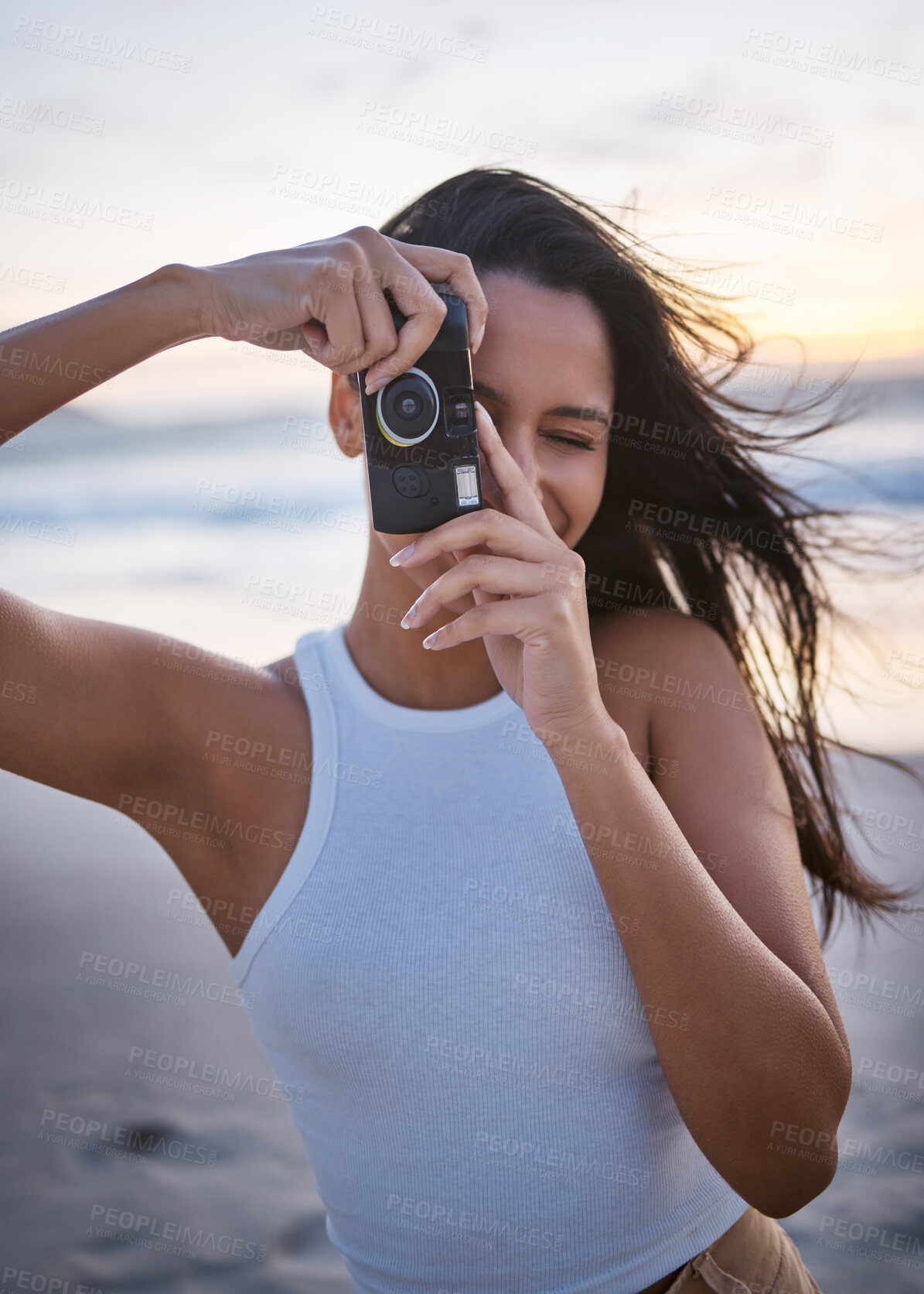 Buy stock photo Beach, woman and happy with camera for fun, holiday and break with photography in Mauritius. Female person, smile and memories at seaside  for summer vacation, relax and rest with breeze or fresh air