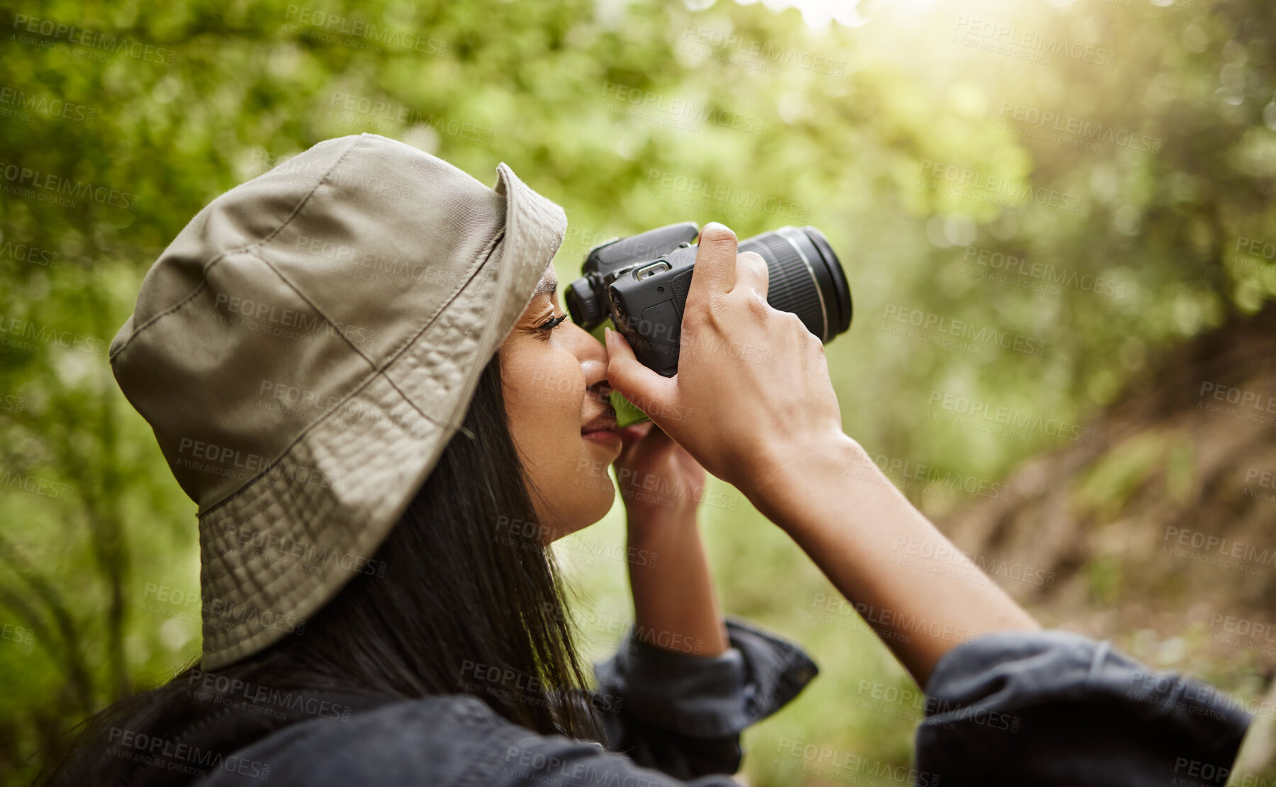 Buy stock photo Woman, photographer and camera to explore forest, hiking and jungle for travel journalism. Female person, trekking and capture memory of natural ecosystem, sightseeing and photography in Indonesia