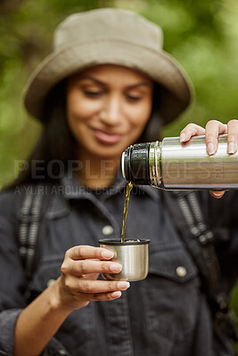 Buy stock photo Woman, hiking and pouring coffee in nature for journey, exploration and hot beverage. Ecologist, flask and outdoor with cup for drink, travel and prepared for wilderness adventure with warm tea