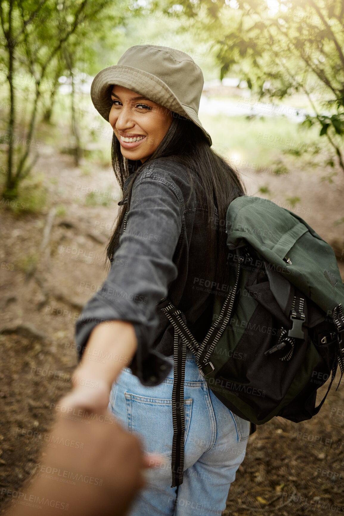 Buy stock photo Happy woman, hiker and holding hands with backpack in nature for walk, travel or adventure together. Young, female person or tourist with smile for support on outdoor journey or trekking in forest