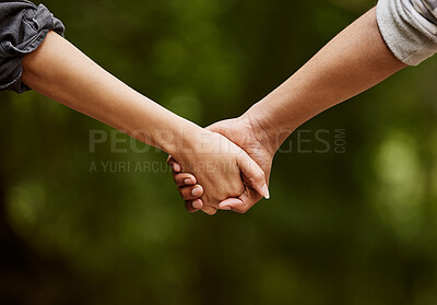 Buy stock photo Couple, holding hands and walk in nature for bonding, love and weekend trip to garden for romance. People, travel and partnership in environment for support, outdoor date and relax on holiday in park