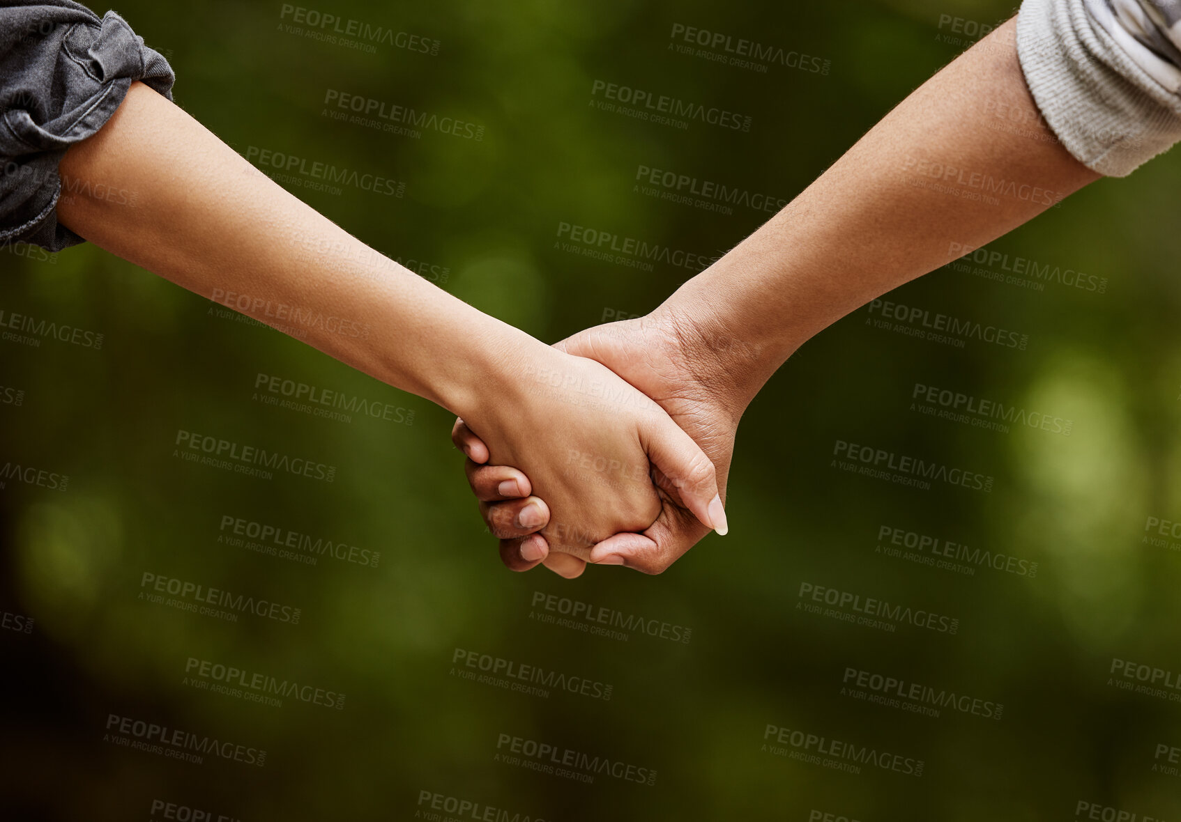 Buy stock photo Couple, holding hands and walk in nature for bonding, love and weekend trip to garden for romance. People, travel and partnership in environment for support, outdoor date and relax on holiday in park