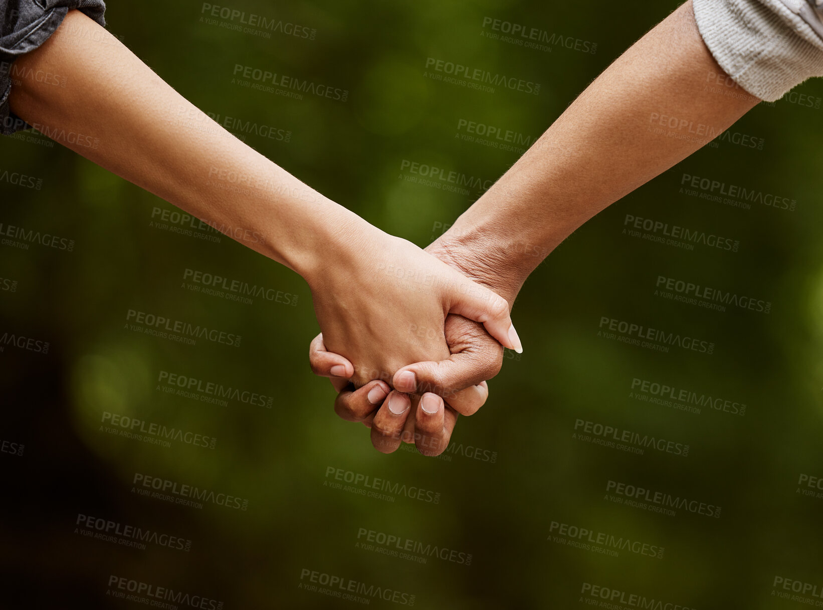 Buy stock photo Couple, holding hands and walk in countryside for bonding, love and weekend trip to garden for romance. People, travel and closeup in environment for support, outdoor and relax on holiday in park