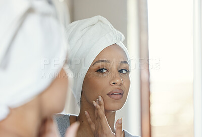 Buy stock photo Shot of a young woman getting ready in a bathroom at home