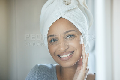 Buy stock photo Shot of a young woman getting ready in a bathroom at home