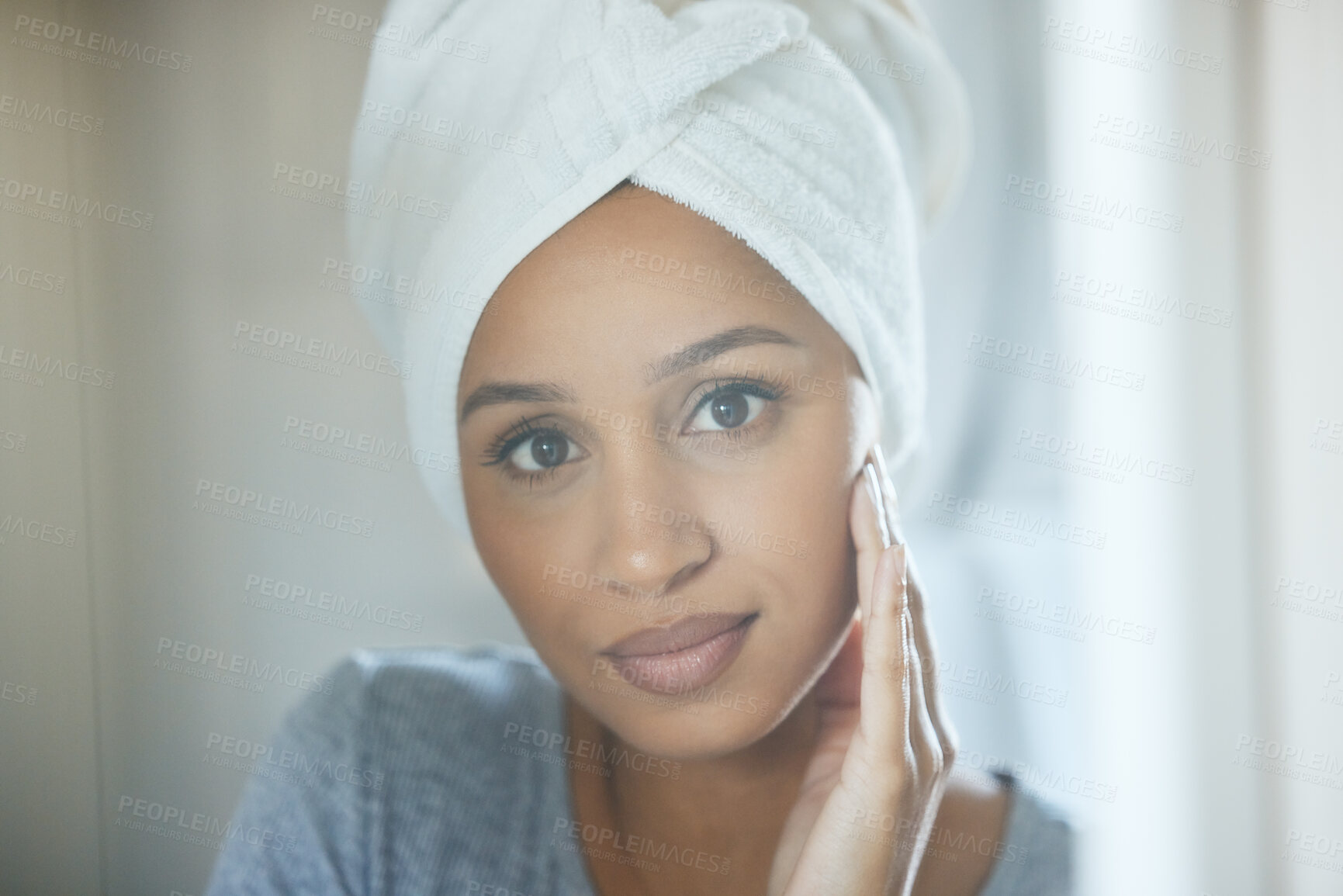 Buy stock photo Shot of a young woman getting ready in a bathroom at home