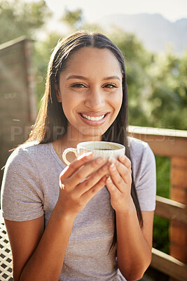 Buy stock photo Woman, portrait and coffee on balcony for travel, vacation or happy for mental health. Girl, herbal tea or relax on resort deck with smile, comfort or holiday with nature view at luxury accommodation