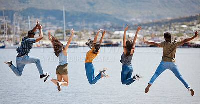 Buy stock photo People, jump and outdoor freedom in air, international holiday and group together for bonding. Friends, weekend trip and movement of energy for hangout in Monaco, back and waterfront for celebration