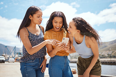 Buy stock photo Phone, surprise and girl friends on holiday at harbor reading blog with gossip, celebrity headlines or news. Happy, travel and women with cellphone for online social networking together on vacation.