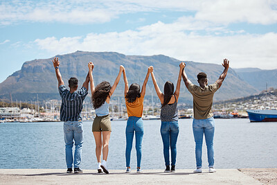 Buy stock photo People, holding hands and outdoor freedom on vacation, reunion and group together for bonding. Friends, weekend and support on adventure for hangout in Monaco, back and waterfront for celebration