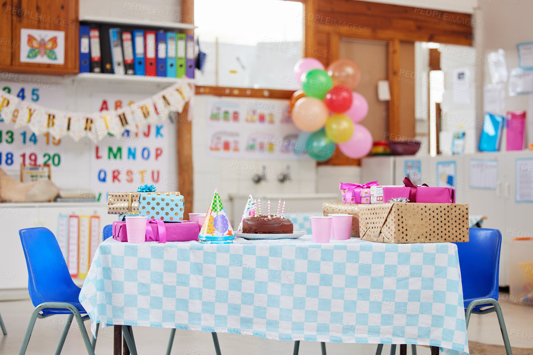 Buy stock photo Shot of an empty class room decorated for a birthday party