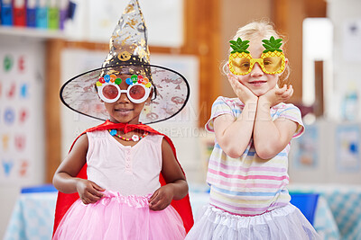 Buy stock photo Shot of two girls playing dress-up in class