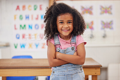 Buy stock photo Shot of an adorable little girl in class