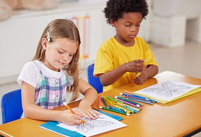 Buy stock photo Shot of preschool students colouring in class
