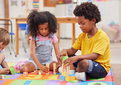 Buy stock photo Shot of preschoolers playing together in a class