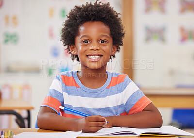 Buy stock photo Shot of a preschooler colouring in class