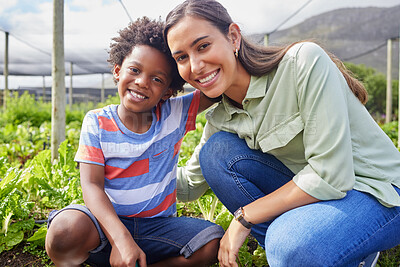 Buy stock photo Cropped portrait of an attractive young woman and adorable little boy working on a farm