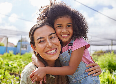 Buy stock photo Cropped portrait of an attractive young woman and adorable little girl working on a farm