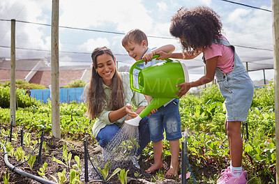 Buy stock photo Full length shot of an attractive young woman and two adorable little kids working on a farm