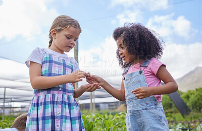 Buy stock photo Cropped shot of two adorable little kids working on a farm