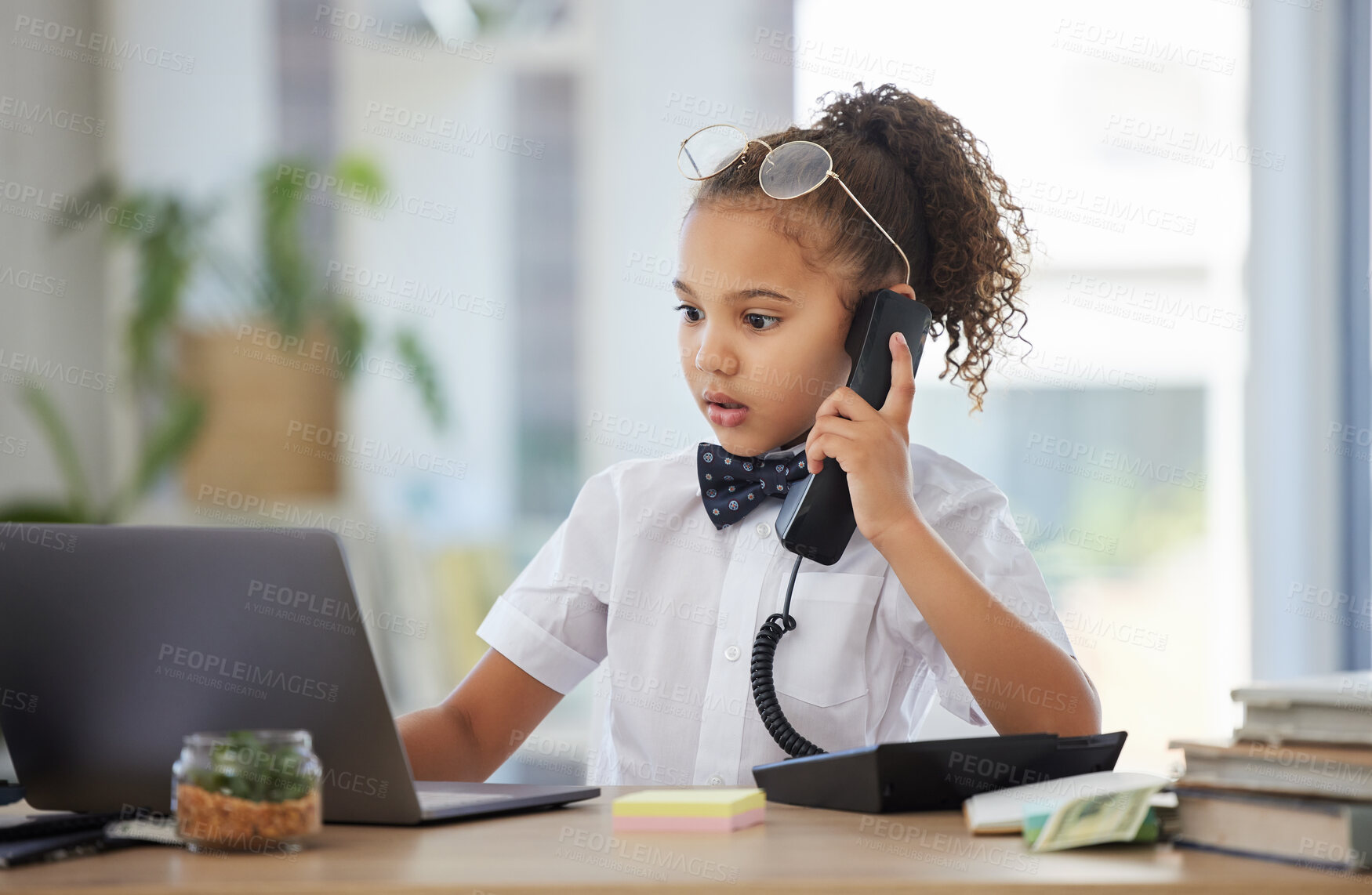 Buy stock photo Children, telephone and a girl having fun in an office as a fantasy businesswoman at work on a laptop. Kids, phone call and a female child working at a desk while using her imagination to pretend