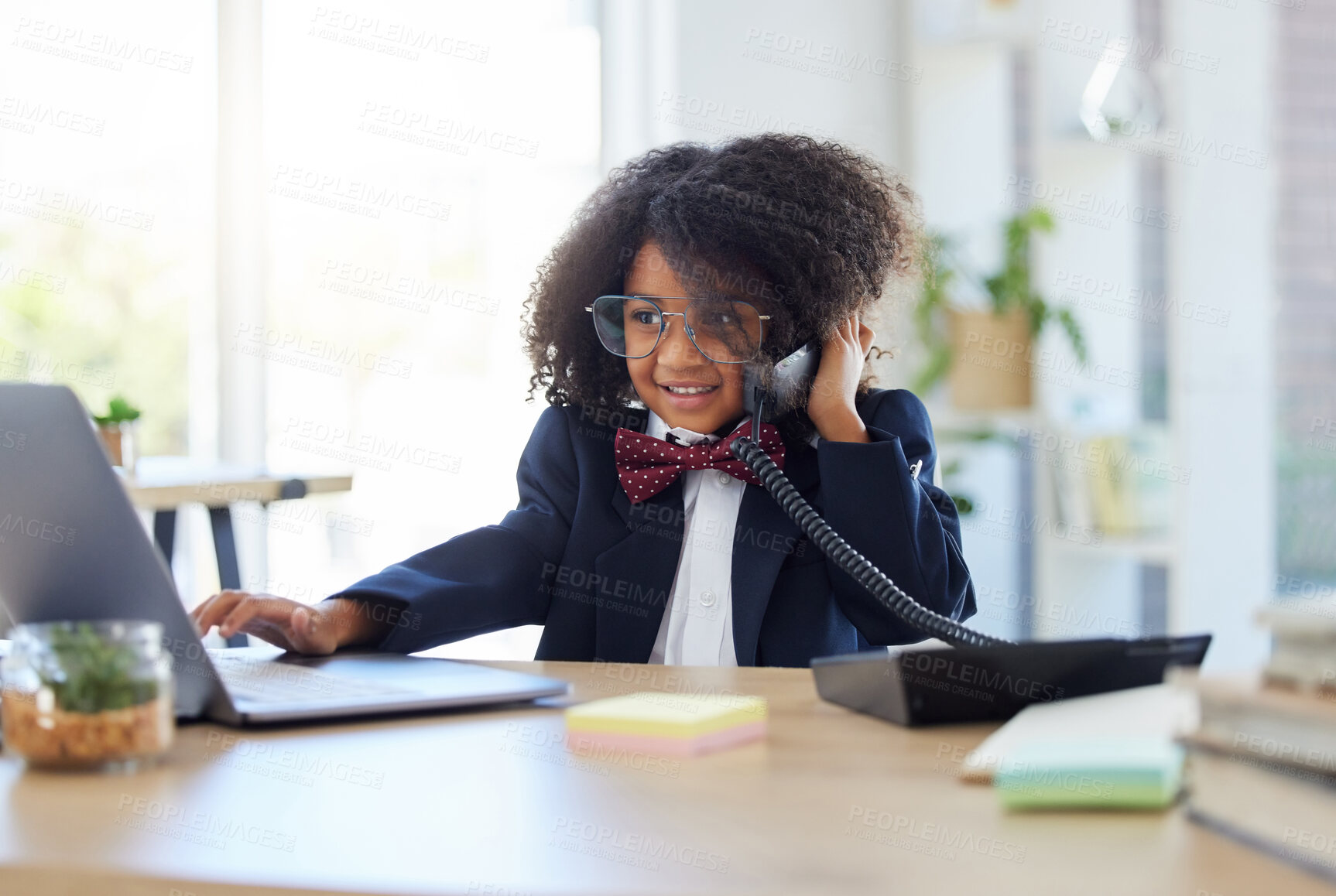 Buy stock photo Young child, playing office and phone call with laptop for networking, contact or communication. Girl, smile and listening for deal, negotiation and reading website on computer at desk in workplace