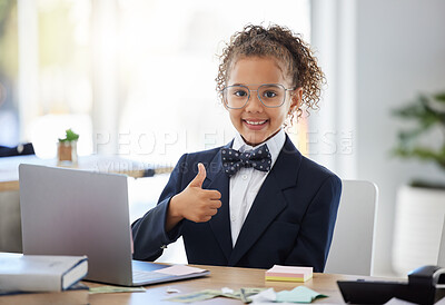 Buy stock photo Girl child, playing business and thumbs up with laptop for success, happiness and career games. Kid, happy smile and hand sign for deal, agreement and future by computer at desk in modern office