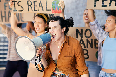 Buy stock photo Cropped shot of a group of young people protesting in the city